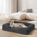 Dog enjoying lying on the boucle dog bed