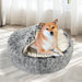 Dog in the pet cave dog bed​