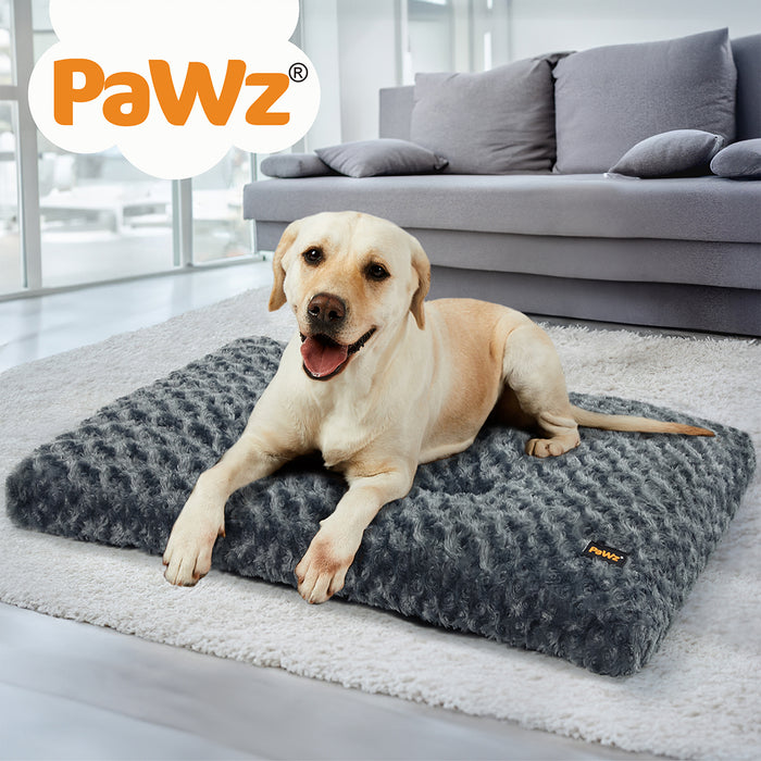 Dog relaxing on Pawz plush dog bed​ 