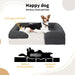 Happy Dog sitting on the boucle dog bed