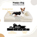 Happy dog on white boucle dog bed