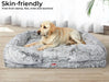 Labrador Sitting on a Grey Orthopaedic Pet Bed with Raised Edges