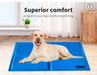 Medium size Dog sitting on canine cooling mat​