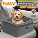 Puppy in small dog car seats booster​ in front seat of car