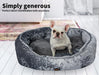 Puppy sitting in the PaWz Calming Pet Bed Set 