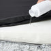 Water dropping on pawz-orthopaedic dog bed