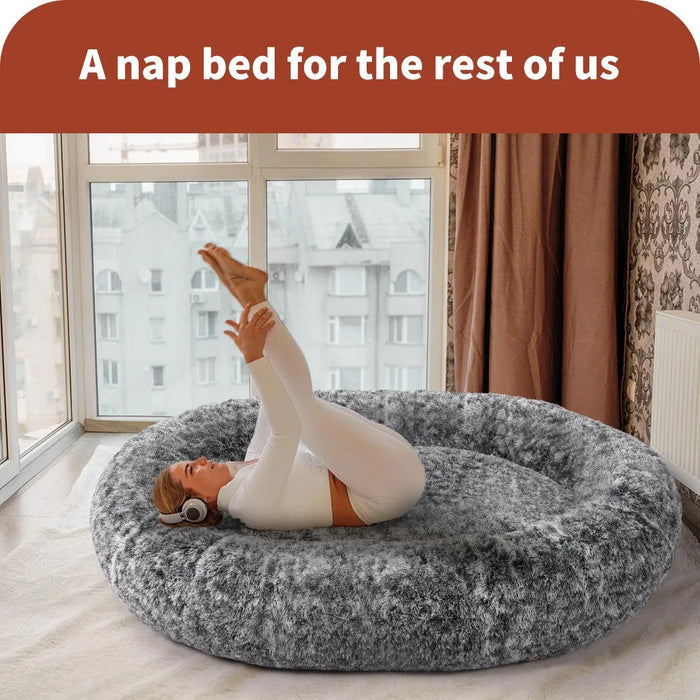 Women doing yoga on the Human size bed