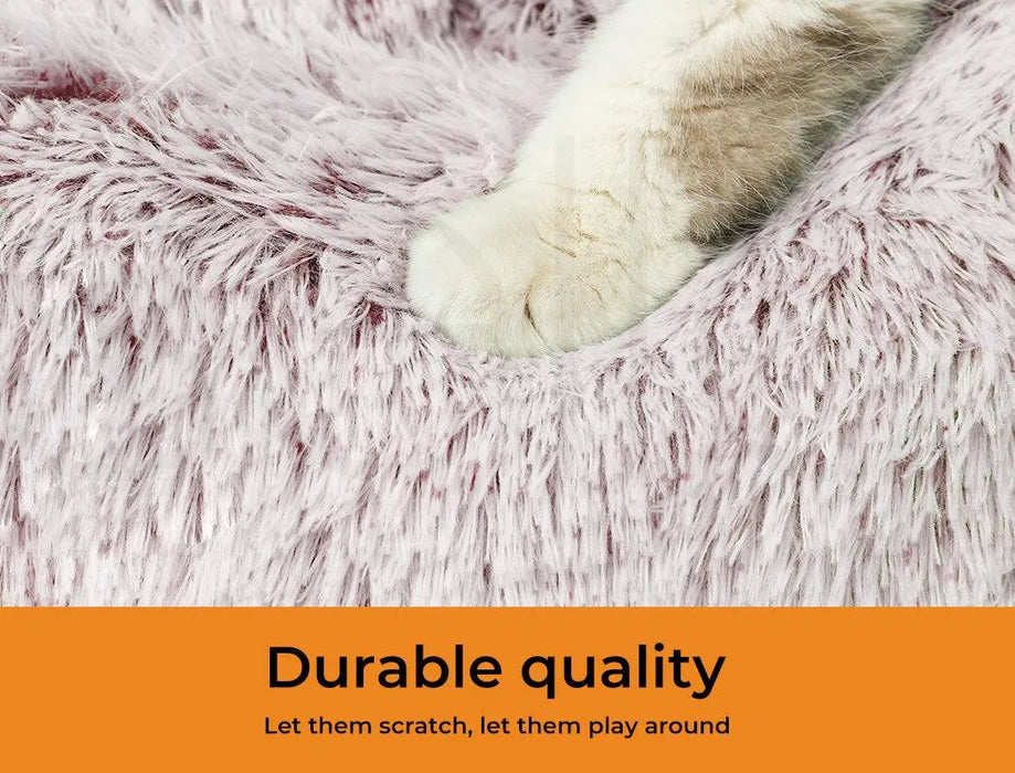 cat on PaWz Calming Donut Cat Bed pink 