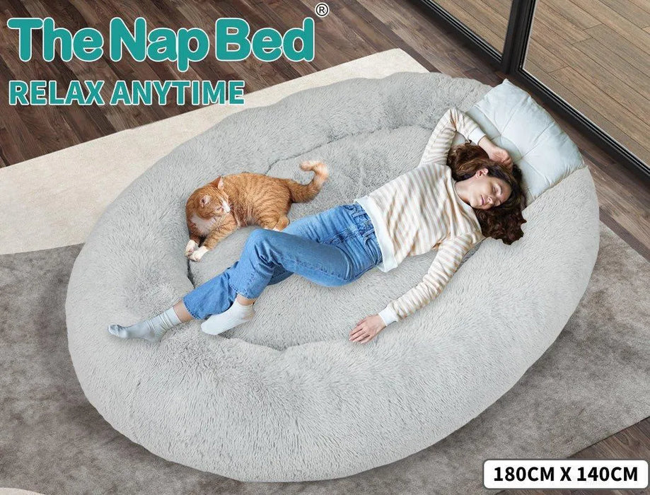 cat with lady on the PaWz Large Fluffy pet Bed 