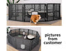 dog coming out from playpen