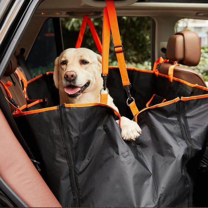 Dog sitting on PaWz Premium Pet Back Car Seat Cover in car