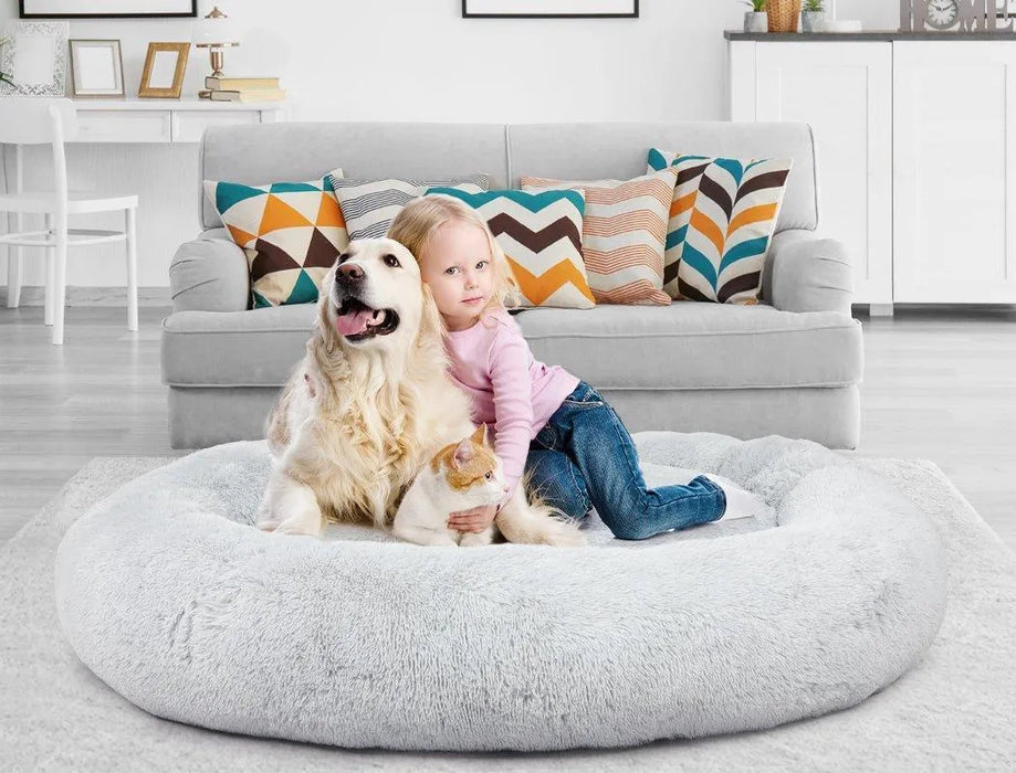 kid with cat and dog on The Human Size Nap Bed 