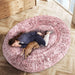 lady resting on the pink extra large bed