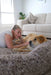owner with dog on  The Human Size Nap Bed
