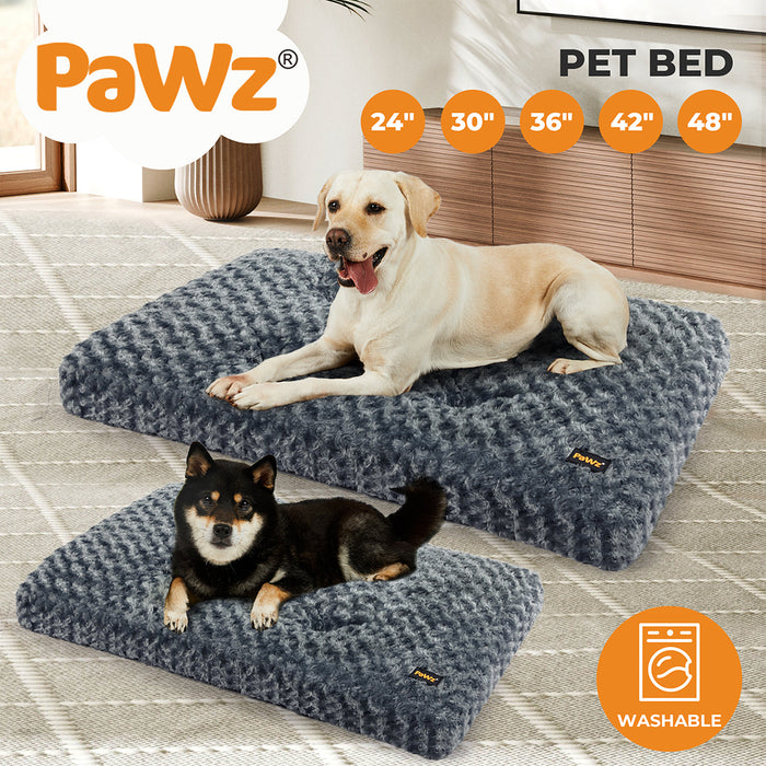 two dog sitting on their calming dog bed​