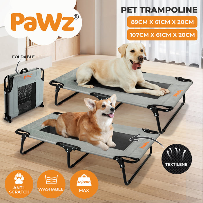 two dogs sitting on the PaWz Raised pet Bed 